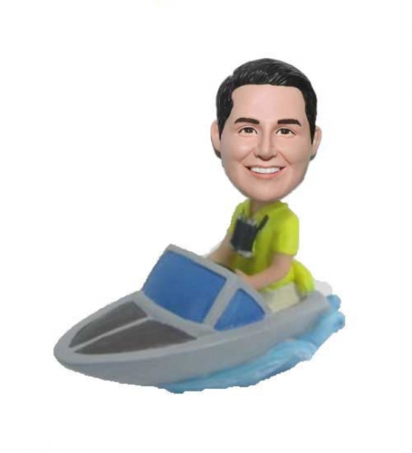 Sitting in boat bobble head dolls