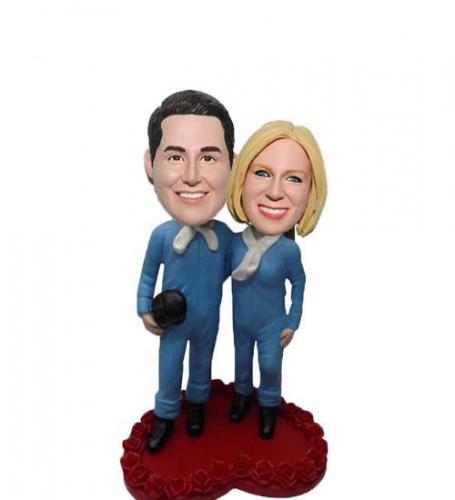 Dressed Alike couple bobble head dolls