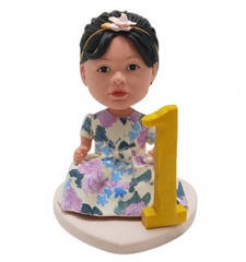 Custom bobblehead cake topper for 1st birthday