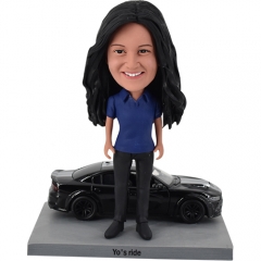 Custom bobblehead standing before Dodge Charger