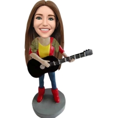 Guitar player bobbleheads