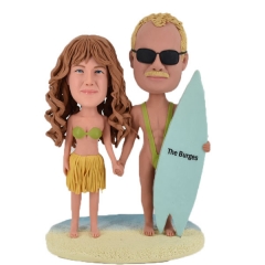 Beach wedding cake topper with surfboard