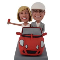 Couple in car customized wedding bobbleheads