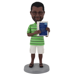 Custom bobble head figure with book