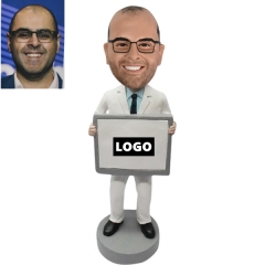 Doctor Bobblehead holding logo slogan sign