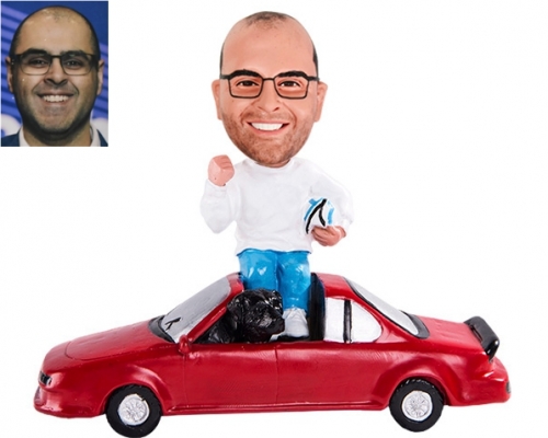 Custom Bobble head sitting on car racer with helmet