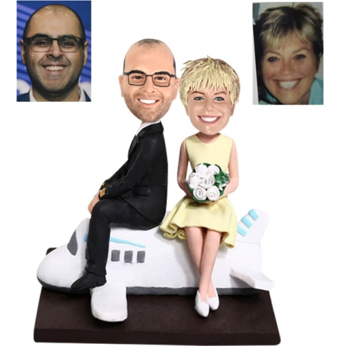 Custom wedding bobblehead cake toppers on airplane Aviator Pilot