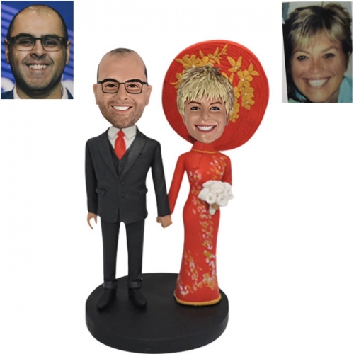 Bobble head cake topper with Vietnamese bride