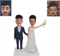 Custom Bitmoji cake toppers holding champagne