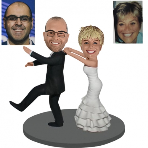 Custom bride and runaway groom bobbleheads cake toppers