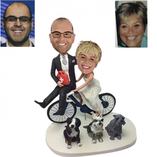 Wedding bobbleheads on Bicycle