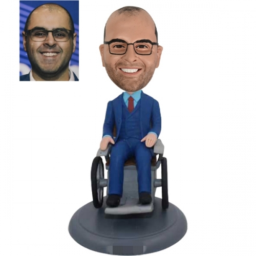 Custom bobblehead in wheelchair