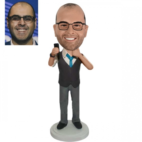 Custom bobble head dolls holding Iphone