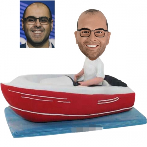Custom Bobblehead sitting in boat