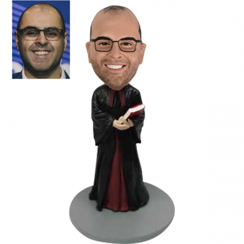 Clergy bobblehead doll