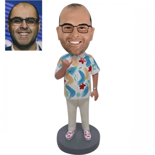 Hawaii style bobblehead doll