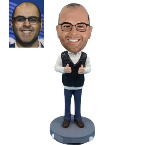 Thumbs up bobble head doll