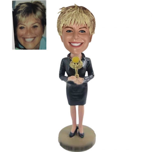 Personalized bobblehead doll at Company party