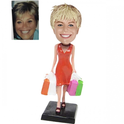 Shopaholic bobble head doll