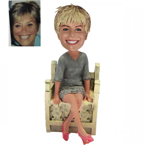 Custom Female bobblehead sitting on chair