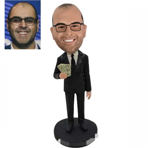 Bobbleheads with dollar