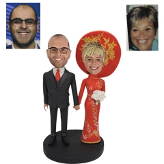 Bobble head cake topper with Vietnamese bride