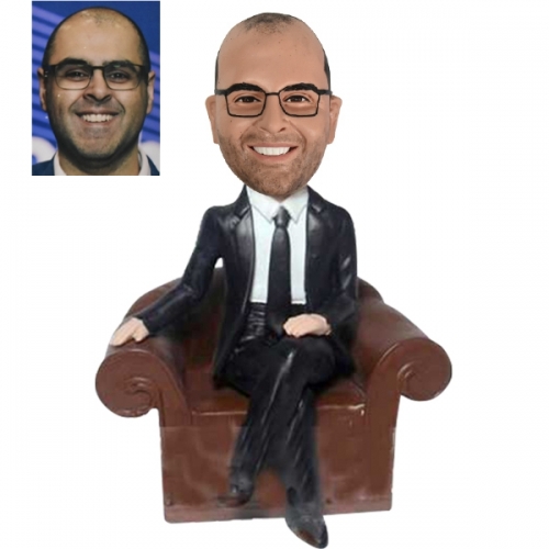 Custom bobblehead in sofa