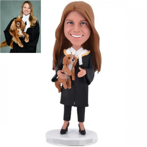 Custom female lawyer Bobblehead from photo holding dog