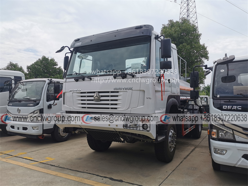 Sinotruk HOWO 4x4 AWD 6000 liter fuel dispenser diesel transfer tank oil tanker truck for sale