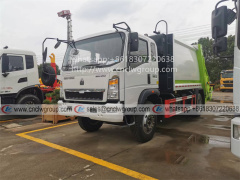 Sinotruk HOWO 10cbm living garbage compactor with rear loader 120L/240L plastic trash bins