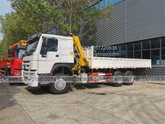 Sinotruk HOWO RHD 6x4 folding arm truck mounted crane