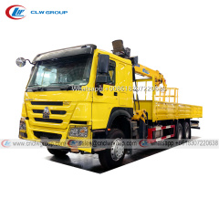 HOWO 6x4 Truck Mounted XCMG 6.3 Ton Boom Crane & 200kg load basket