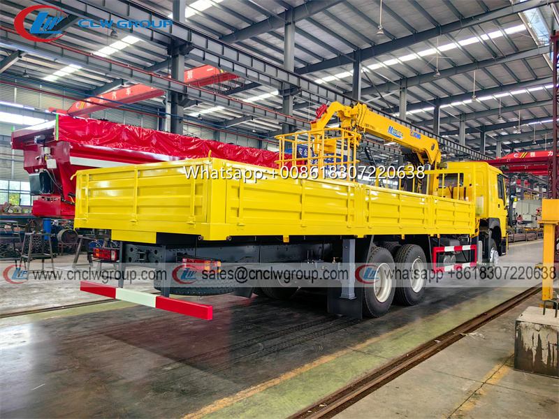HOWO 6x4 Truck Mounted XCMG 6.3 Ton Boom Crane & 200kg load basket