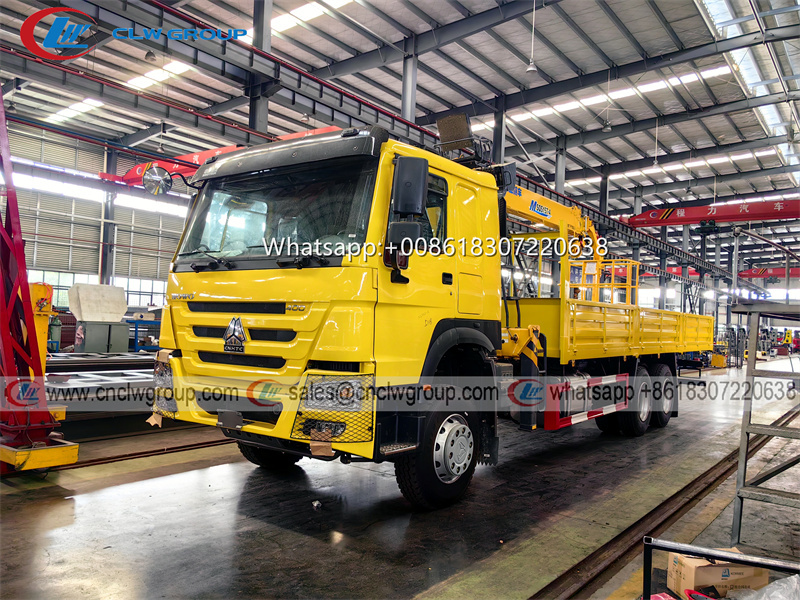 HOWO 6x4 Truck Mounted XCMG 6.3 Ton Boom Crane & 200kg load basket
