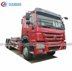 SINOTRUK HOWO RHD 6x4 25 ton hooklift truck with 25cbm box