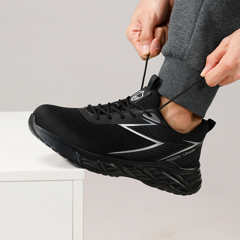 GUYISA  Black flying woven fabric European standard steel toe cap anti - smashing and anti - piercing safety shoes