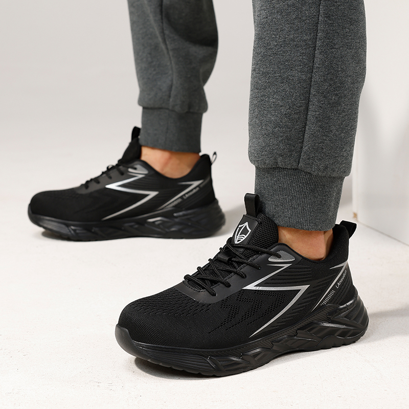 GUYISA  Black flying woven fabric European standard steel toe cap anti - smashing and anti - piercing safety shoes
