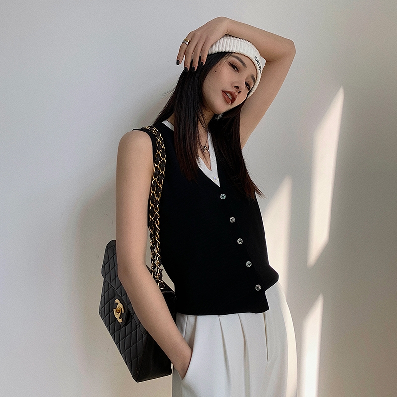 早春新款韓版小眾V領假兩件針織開衫女法式個性拼接撞色內搭馬甲21041502