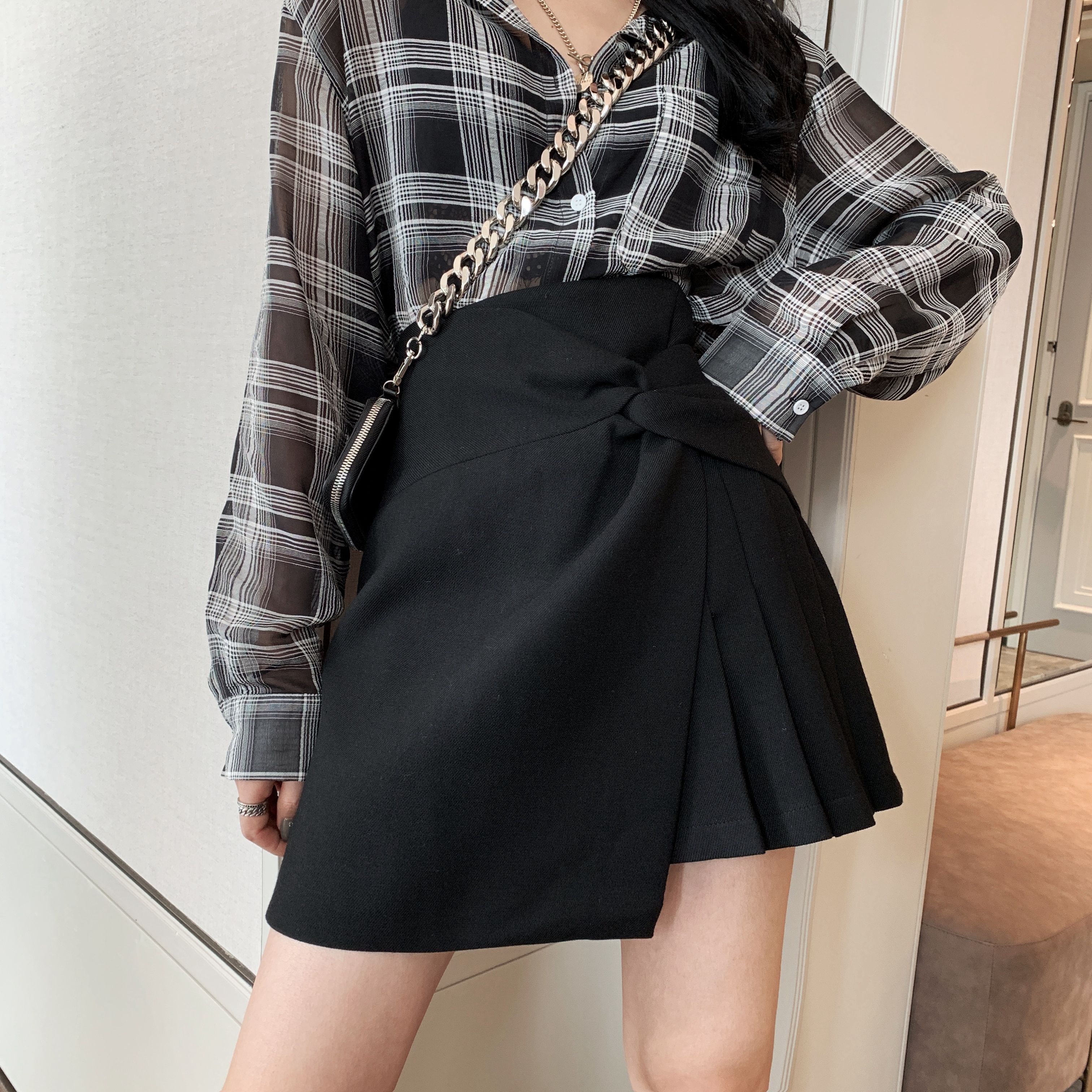 秋裝新款純色簡約設計感百褶不規則打結高腰半身裙女顯瘦A字短裙21122306