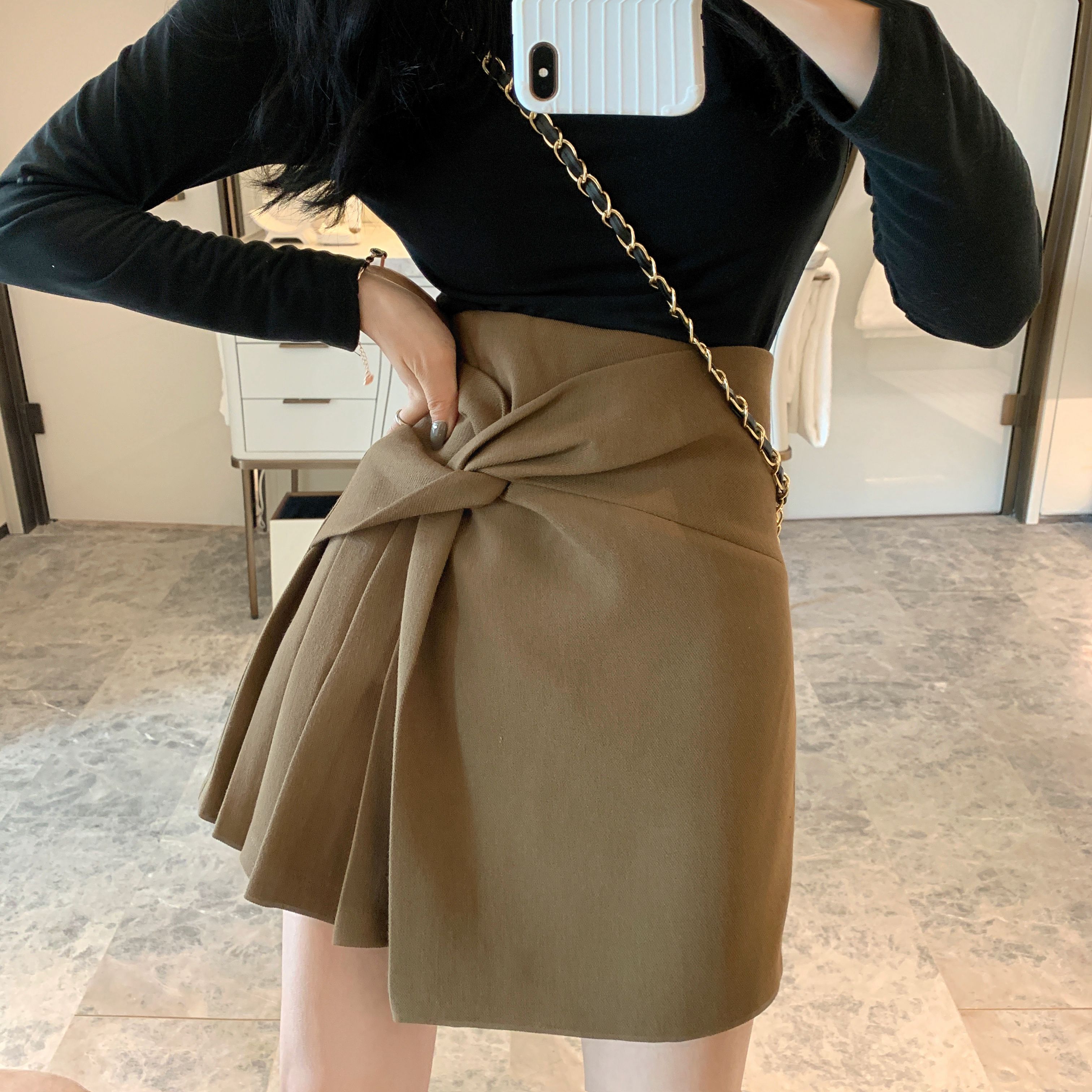 秋裝新款純色簡約設計感百褶不規則打結高腰半身裙女顯瘦A字短裙21122306
