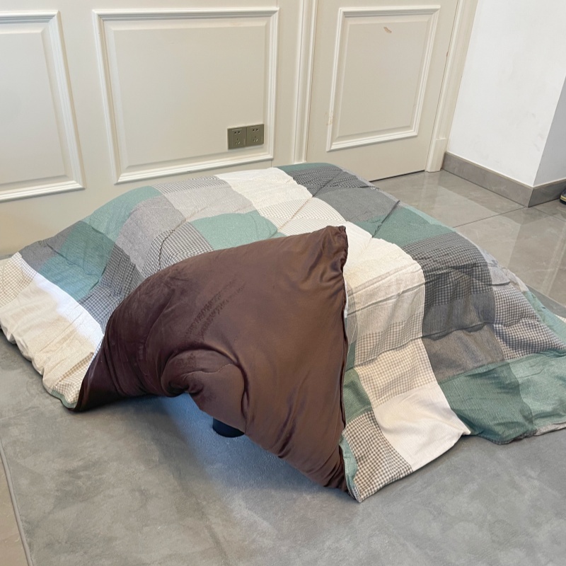 Stay Warm with a 4-Piece Kotatsu Set - Black Table, Heater, Futon