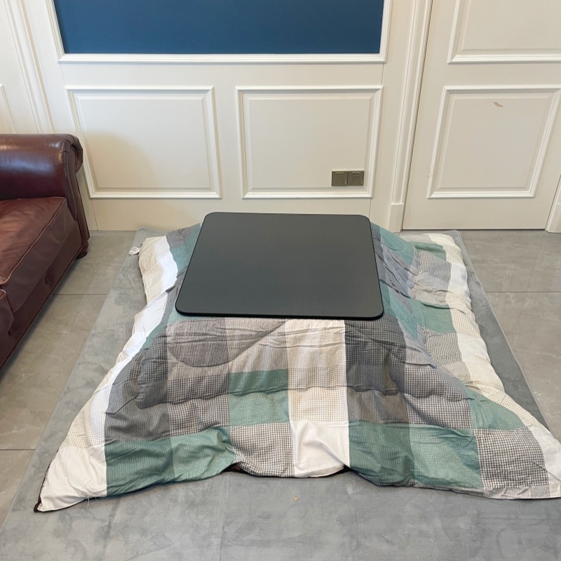 Stay Warm with a 4-Piece Kotatsu Set - Black Table, Heater, Futon