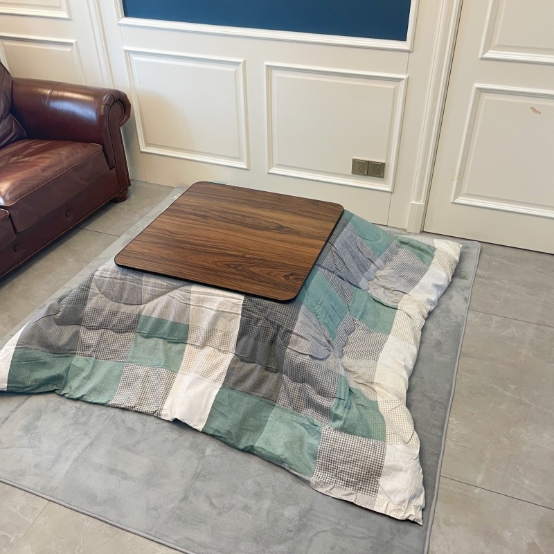 Stay Warm with a 4-Piece Kotatsu Set - Black Table, Heater, Futon