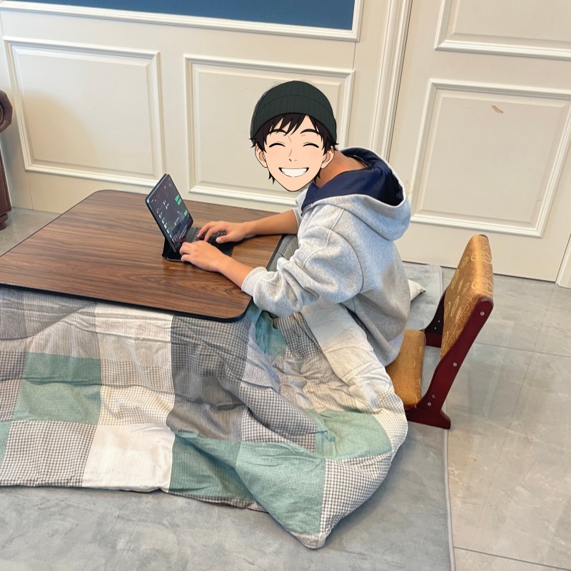 Stay Warm with a 4-Piece Kotatsu Set - Black Table, Heater, Futon