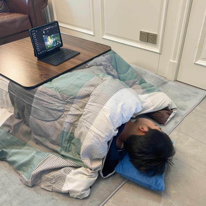 Stay Warm with a 4-Piece Kotatsu Set - Black Table, Heater, Futon