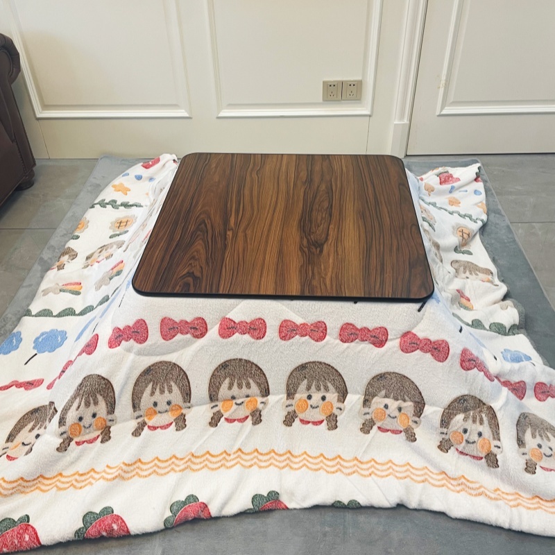 Stay Warm with a 4-Piece Kotatsu Set - Black Table, Heater, Futon