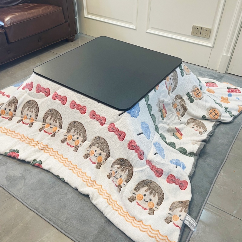 Stay Warm with a 4-Piece Kotatsu Set - Black Table, Heater, Futon