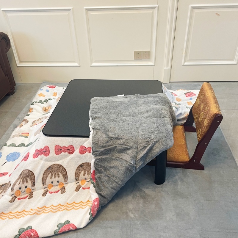 Stay Warm with a 4-Piece Kotatsu Set - Black Table, Heater, Futon