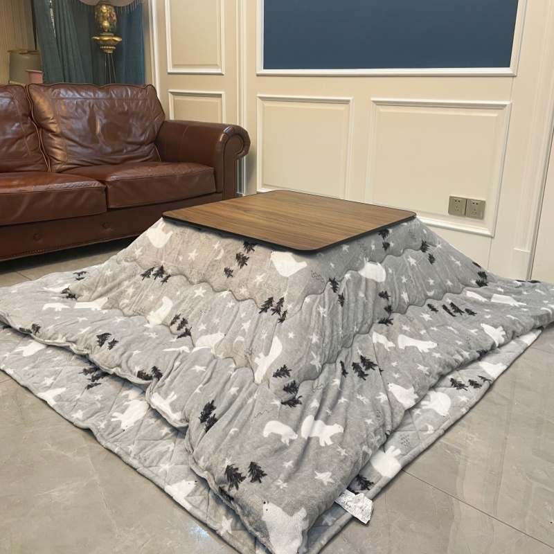 Stay Warm with a 4-Piece Kotatsu Set - Black Table, Heater, Futon