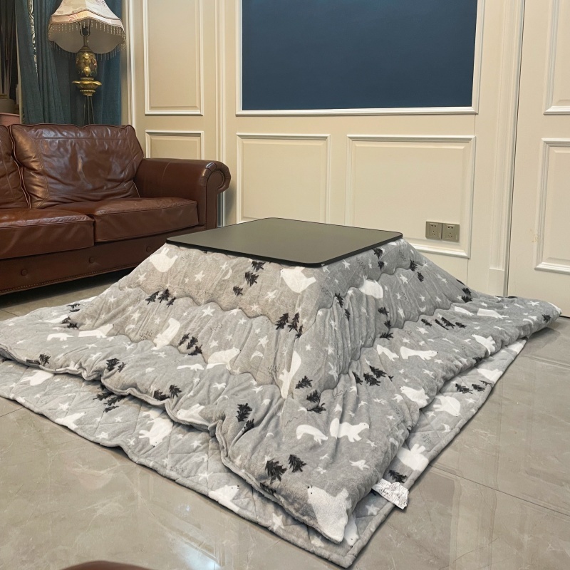 Stay Warm with a 4-Piece Kotatsu Set - Black Table, Heater, Futon